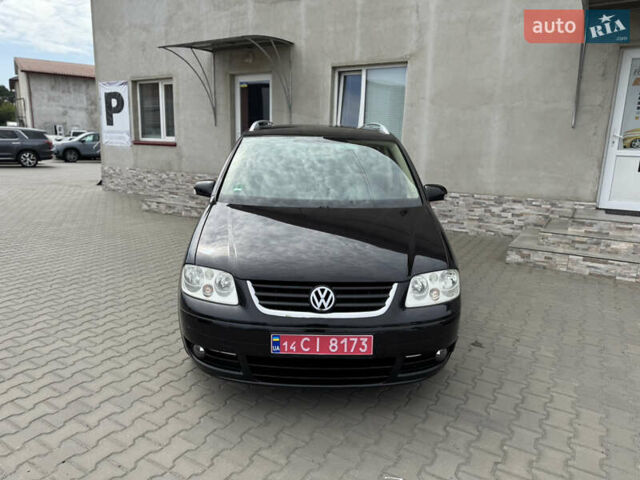 Черный Фольксваген Туран, объемом двигателя 1.98 л и пробегом 188 тыс. км за 4600 $, фото 3 на Automoto.ua