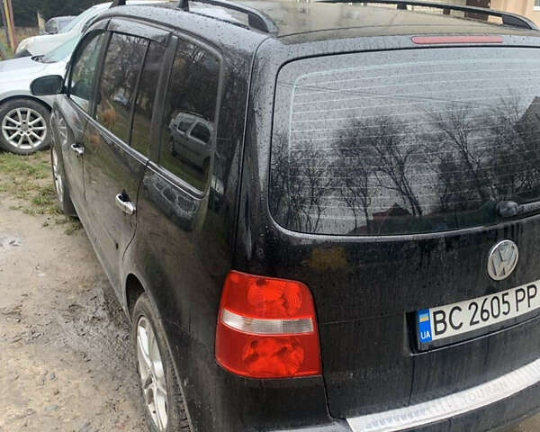 Черный Фольксваген Туран, объемом двигателя 1.9 л и пробегом 358 тыс. км за 5500 $, фото 10 на Automoto.ua