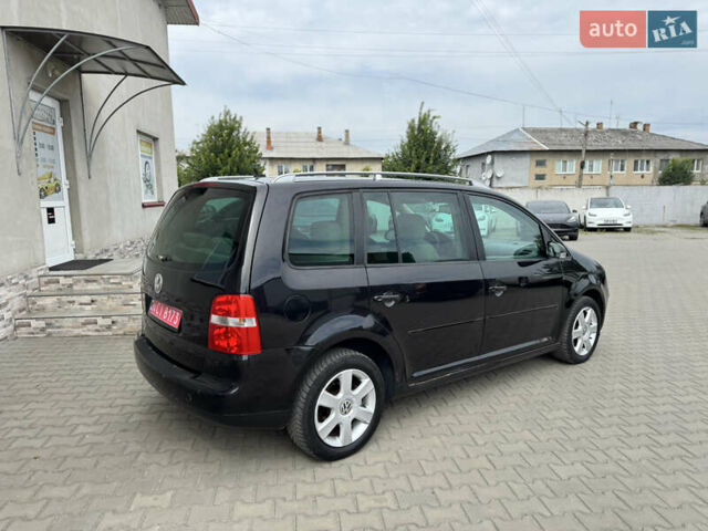 Черный Фольксваген Туран, объемом двигателя 1.98 л и пробегом 188 тыс. км за 4600 $, фото 15 на Automoto.ua