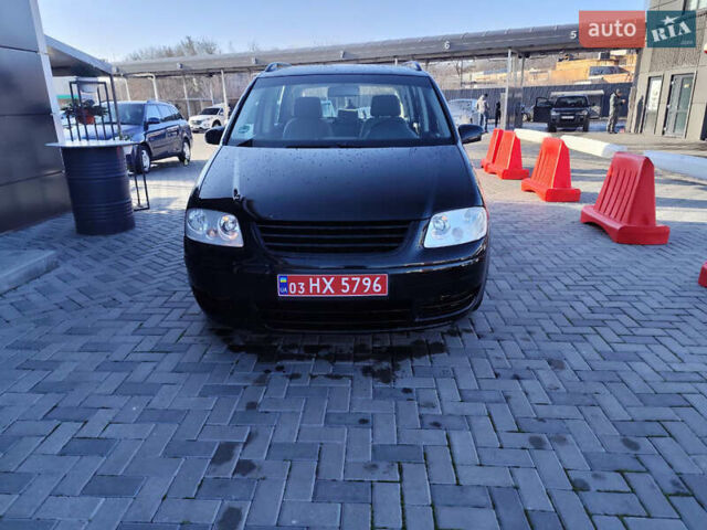 Черный Фольксваген Туран, объемом двигателя 1.6 л и пробегом 219 тыс. км за 5850 $, фото 3 на Automoto.ua