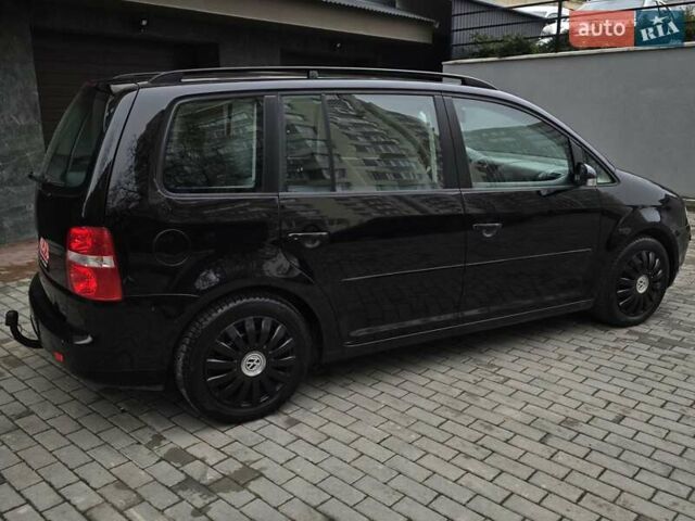 Черный Фольксваген Туран, объемом двигателя 1.6 л и пробегом 219 тыс. км за 5399 $, фото 10 на Automoto.ua