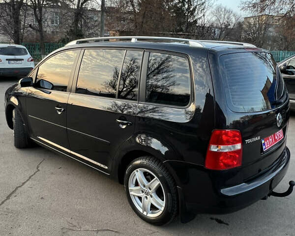 Черный Фольксваген Туран, объемом двигателя 1.6 л и пробегом 229 тыс. км за 6450 $, фото 13 на Automoto.ua