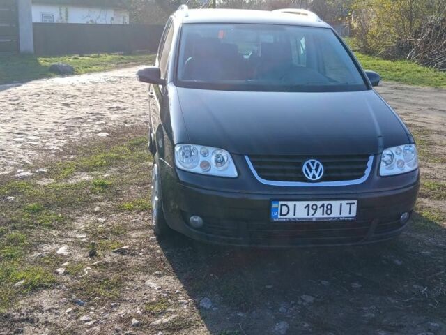 Черный Фольксваген Туран, объемом двигателя 2 л и пробегом 290 тыс. км за 6000 $, фото 7 на Automoto.ua