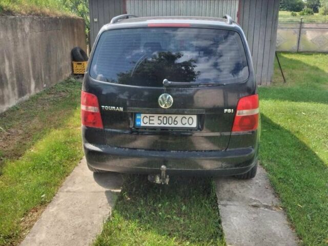 Черный Фольксваген Туран, объемом двигателя 1.6 л и пробегом 380 тыс. км за 5100 $, фото 3 на Automoto.ua