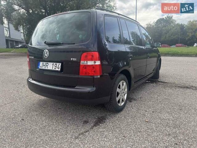 Фольксваген Туран 2005 в Житомире на Automoto.ua Черный Фольксваген Туран, объемом двигателя 1.6 л и пробегом 186 тыс. км за 6950 $, фото 2 на Automoto.ua