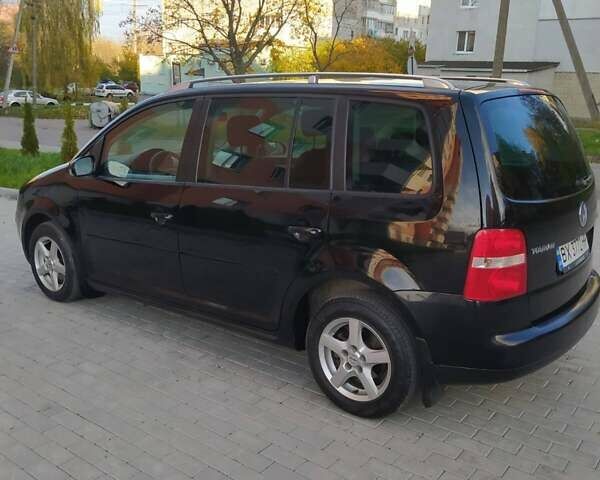 Черный Фольксваген Туран, объемом двигателя 1.6 л и пробегом 283 тыс. км за 5200 $, фото 14 на Automoto.ua