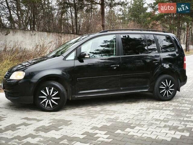 Черный Фольксваген Туран, объемом двигателя 2 л и пробегом 321 тыс. км за 5500 $, фото 10 на Automoto.ua