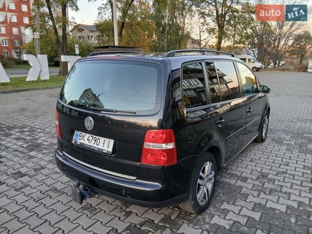 Чорний Фольксваген Туран, об'ємом двигуна 1.6 л та пробігом 279 тис. км за 4400 $, фото 3 на Automoto.ua