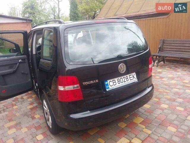 Черный Фольксваген Туран, объемом двигателя 1.6 л и пробегом 277 тыс. км за 6200 $, фото 1 на Automoto.ua