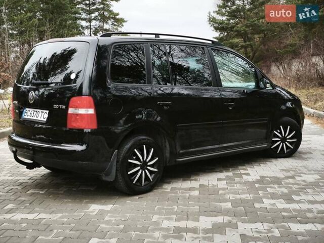 Черный Фольксваген Туран, объемом двигателя 2 л и пробегом 321 тыс. км за 5500 $, фото 8 на Automoto.ua