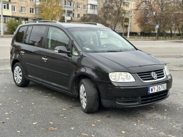 Фольксваген Туран 2005 в Харькове на Automoto.ua Черный Фольксваген Туран, объемом двигателя 0 л и пробегом 123 тыс. км за 2700 $, фото 3 на Automoto.ua