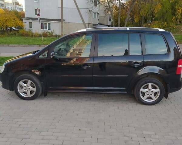 Черный Фольксваген Туран, объемом двигателя 1.6 л и пробегом 283 тыс. км за 5200 $, фото 13 на Automoto.ua