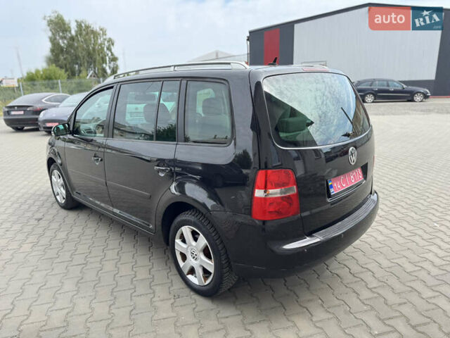 Черный Фольксваген Туран, объемом двигателя 1.98 л и пробегом 188 тыс. км за 4600 $, фото 11 на Automoto.ua