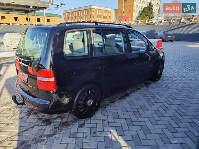 Черный Фольксваген Туран, объемом двигателя 1.6 л и пробегом 219 тыс. км за 5850 $, фото 7 на Automoto.ua