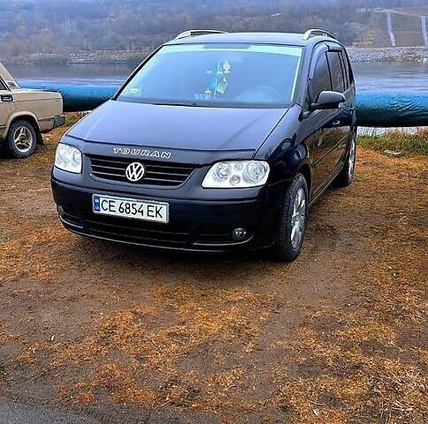 Черный Фольксваген Туран, объемом двигателя 1.9 л и пробегом 385 тыс. км за 5800 $, фото 1 на Automoto.ua