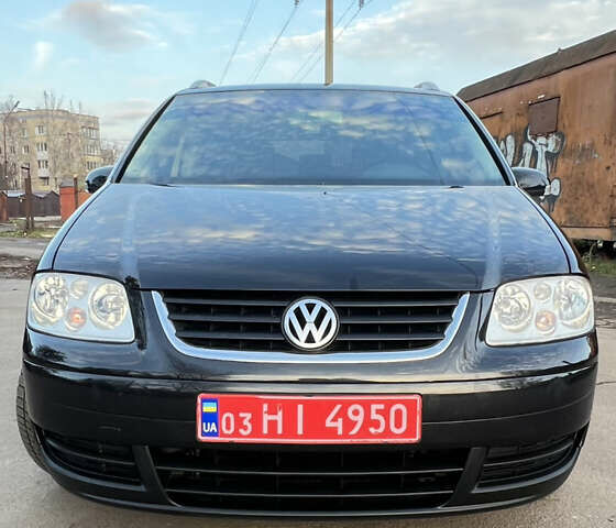 Черный Фольксваген Туран, объемом двигателя 1.6 л и пробегом 229 тыс. км за 6450 $, фото 18 на Automoto.ua