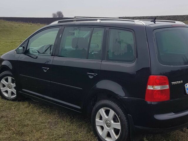 Черный Фольксваген Туран, объемом двигателя 2 л и пробегом 224 тыс. км за 4500 $, фото 3 на Automoto.ua