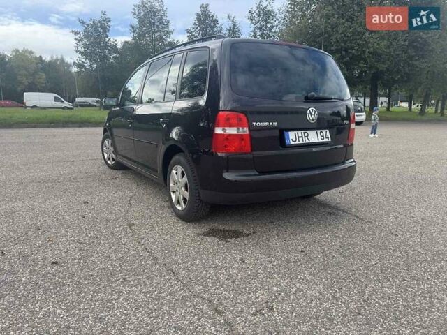 Фольксваген Туран 2005 в Житомире на Automoto.ua Черный Фольксваген Туран, объемом двигателя 1.6 л и пробегом 186 тыс. км за 6950 $, фото 3 на Automoto.ua