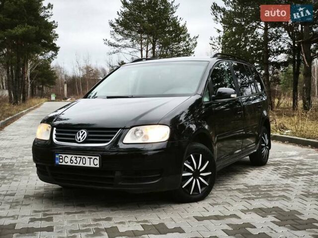 Черный Фольксваген Туран, объемом двигателя 2 л и пробегом 321 тыс. км за 5500 $, фото 7 на Automoto.ua