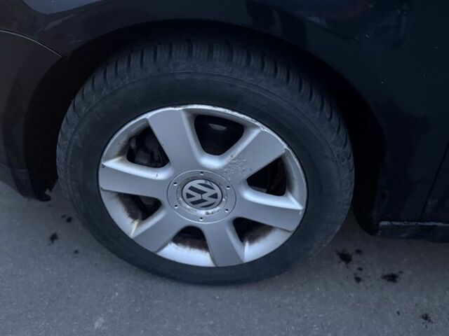 Черный Фольксваген Туран, объемом двигателя 2 л и пробегом 377 тыс. км за 2500 $, фото 10 на Automoto.ua