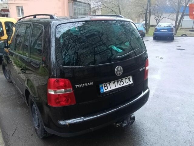 Фольксваген Туран 2005 в Николаеве на Automoto.ua Черный Фольксваген Туран, объемом двигателя 2 л и пробегом 280 тыс. км за 6400 $, фото 7 на Automoto.ua