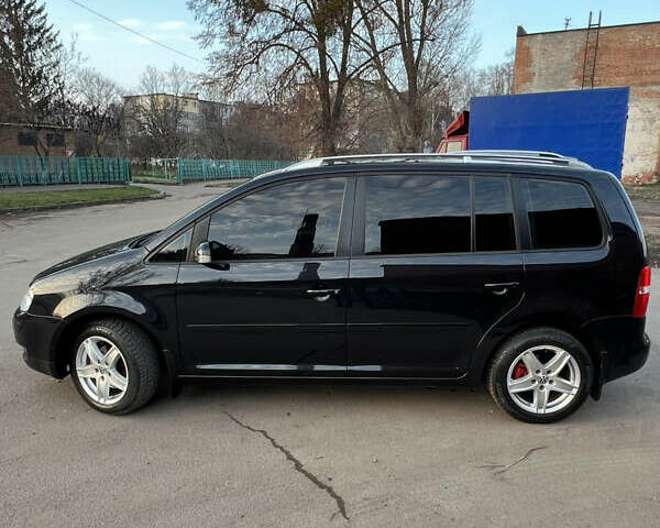 Черный Фольксваген Туран, объемом двигателя 1.6 л и пробегом 229 тыс. км за 6450 $, фото 14 на Automoto.ua