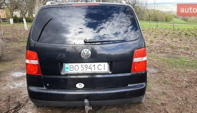 Черный Фольксваген Туран, объемом двигателя 1.9 л и пробегом 280 тыс. км за 6500 $, фото 12 на Automoto.ua