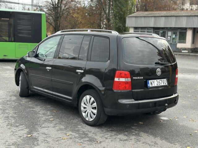 Фольксваген Туран 2005 в Харькове на Automoto.ua Черный Фольксваген Туран, объемом двигателя 0 л и пробегом 123 тыс. км за 2700 $, фото 1 на Automoto.ua