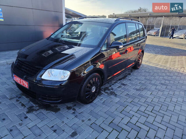 Черный Фольксваген Туран, объемом двигателя 1.6 л и пробегом 219 тыс. км за 5850 $, фото 2 на Automoto.ua