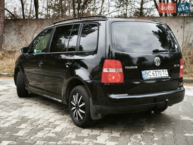 Черный Фольксваген Туран, объемом двигателя 2 л и пробегом 321 тыс. км за 5500 $, фото 5 на Automoto.ua