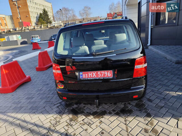 Черный Фольксваген Туран, объемом двигателя 1.6 л и пробегом 219 тыс. км за 5850 $, фото 8 на Automoto.ua