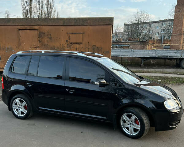 Черный Фольксваген Туран, объемом двигателя 1.6 л и пробегом 229 тыс. км за 6450 $, фото 7 на Automoto.ua