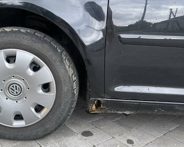 Черный Фольксваген Туран, объемом двигателя 1.9 л и пробегом 284 тыс. км за 6500 $, фото 14 на Automoto.ua