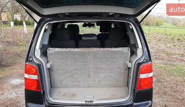 Черный Фольксваген Туран, объемом двигателя 1.9 л и пробегом 280 тыс. км за 6500 $, фото 9 на Automoto.ua