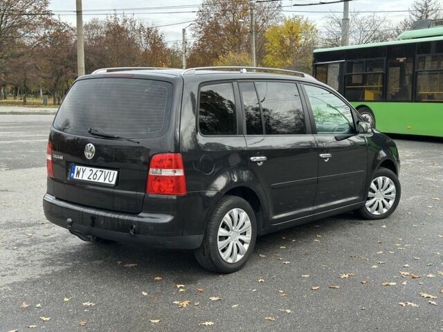 Фольксваген Туран 2005 в Харькове на Automoto.ua Черный Фольксваген Туран, объемом двигателя 0 л и пробегом 123 тыс. км за 2700 $, фото 2 на Automoto.ua