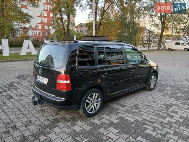 Чорний Фольксваген Туран, об'ємом двигуна 1.6 л та пробігом 279 тис. км за 4400 $, фото 7 на Automoto.ua