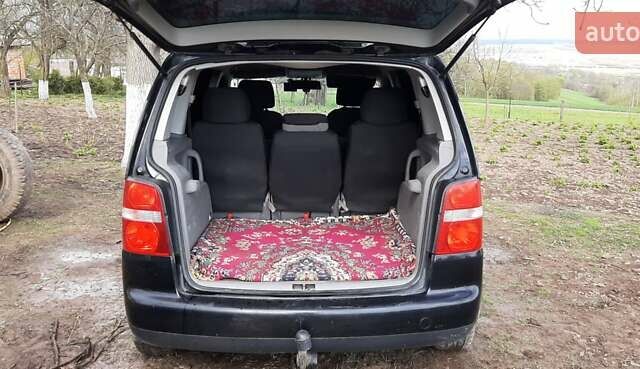 Черный Фольксваген Туран, объемом двигателя 1.9 л и пробегом 280 тыс. км за 6500 $, фото 10 на Automoto.ua