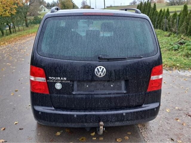 Черный Фольксваген Туран, объемом двигателя 1.6 л и пробегом 205 тыс. км за 5650 $, фото 3 на Automoto.ua