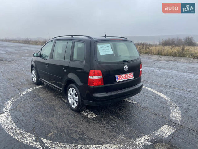 Черный Фольксваген Туран, объемом двигателя 1.6 л и пробегом 198 тыс. км за 6800 $, фото 11 на Automoto.ua