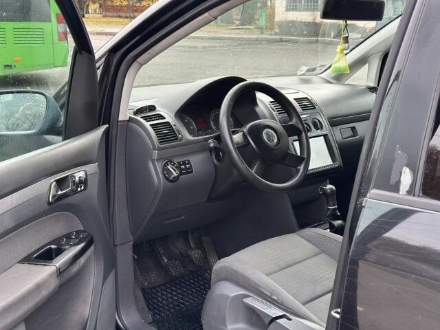 Фольксваген Туран 2005 в Харькове на Automoto.ua Черный Фольксваген Туран, объемом двигателя 0 л и пробегом 123 тыс. км за 2700 $, фото 4 на Automoto.ua