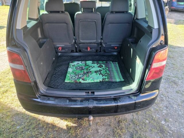 Черный Фольксваген Туран, объемом двигателя 1.9 л и пробегом 419 тыс. км за 4700 $, фото 8 на Automoto.ua