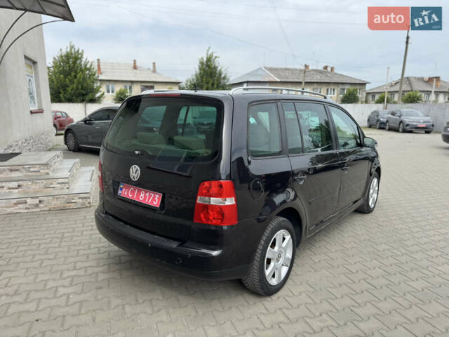 Черный Фольксваген Туран, объемом двигателя 1.98 л и пробегом 188 тыс. км за 4600 $, фото 14 на Automoto.ua