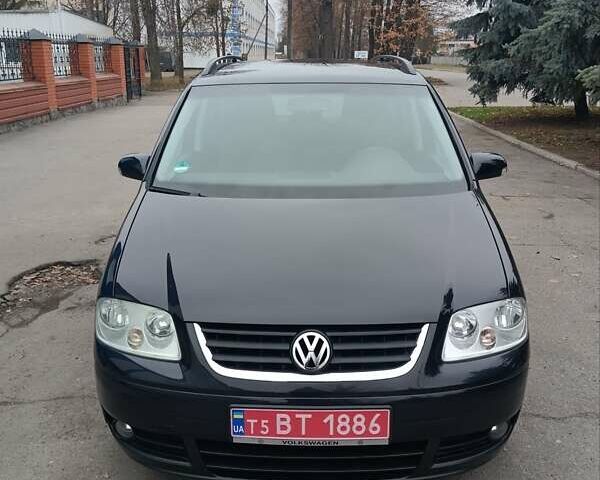 Черный Фольксваген Туран, объемом двигателя 1.6 л и пробегом 204 тыс. км за 6350 $, фото 9 на Automoto.ua