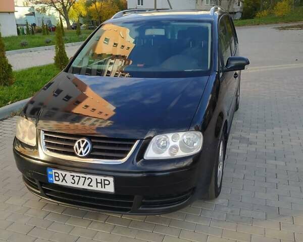 Черный Фольксваген Туран, объемом двигателя 1.6 л и пробегом 283 тыс. км за 5200 $, фото 7 на Automoto.ua