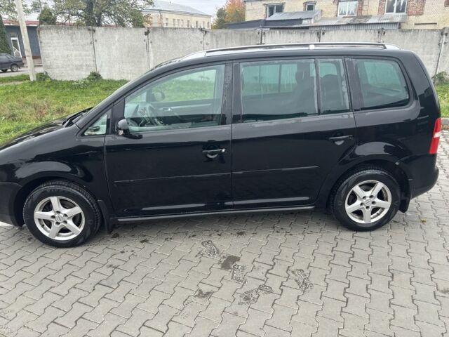 Черный Фольксваген Туран, объемом двигателя 1.6 л и пробегом 290 тыс. км за 4600 $, фото 4 на Automoto.ua