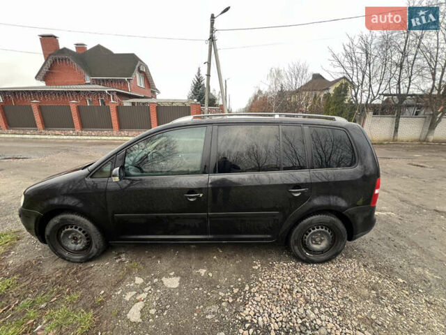 Черный Фольксваген Туран, объемом двигателя 1.6 л и пробегом 287 тыс. км за 4800 $, фото 5 на Automoto.ua