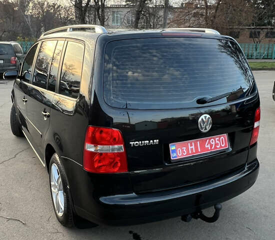 Черный Фольксваген Туран, объемом двигателя 1.6 л и пробегом 229 тыс. км за 6450 $, фото 12 на Automoto.ua