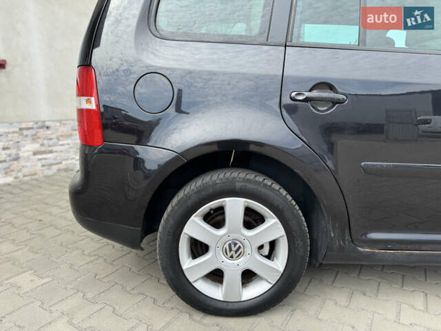 Черный Фольксваген Туран, объемом двигателя 1.98 л и пробегом 188 тыс. км за 4600 $, фото 16 на Automoto.ua