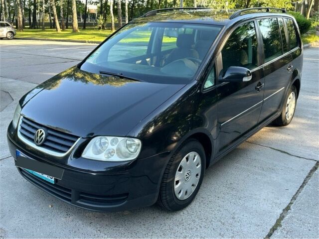 Черный Фольксваген Туран, объемом двигателя 1.9 л и пробегом 333 тыс. км за 142000 $, фото 8 на Automoto.ua