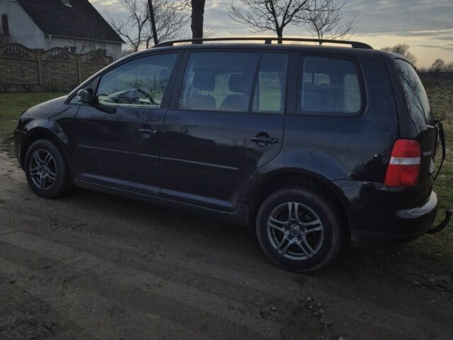 Черный Фольксваген Туран, объемом двигателя 1.9 л и пробегом 217 тыс. км за 2550 $, фото 5 на Automoto.ua